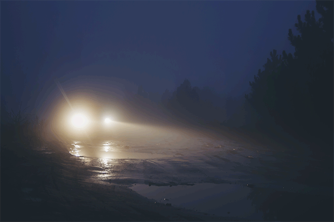 car-headlights-on-winter-night