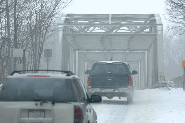 cars-approaching-icy-bridge