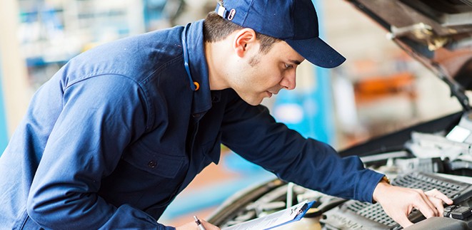 mechanic-inspecting-vehicle