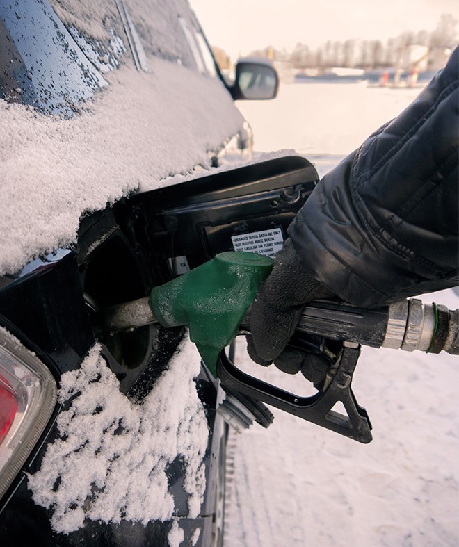 pumping-gas-in-the-winter-snow